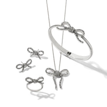 Load image into Gallery viewer, Illumina Bow Hinged Bangle